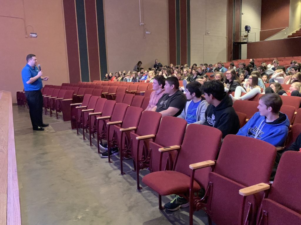 Grant Prenzlow speaks to students Fremont High School Auditorium