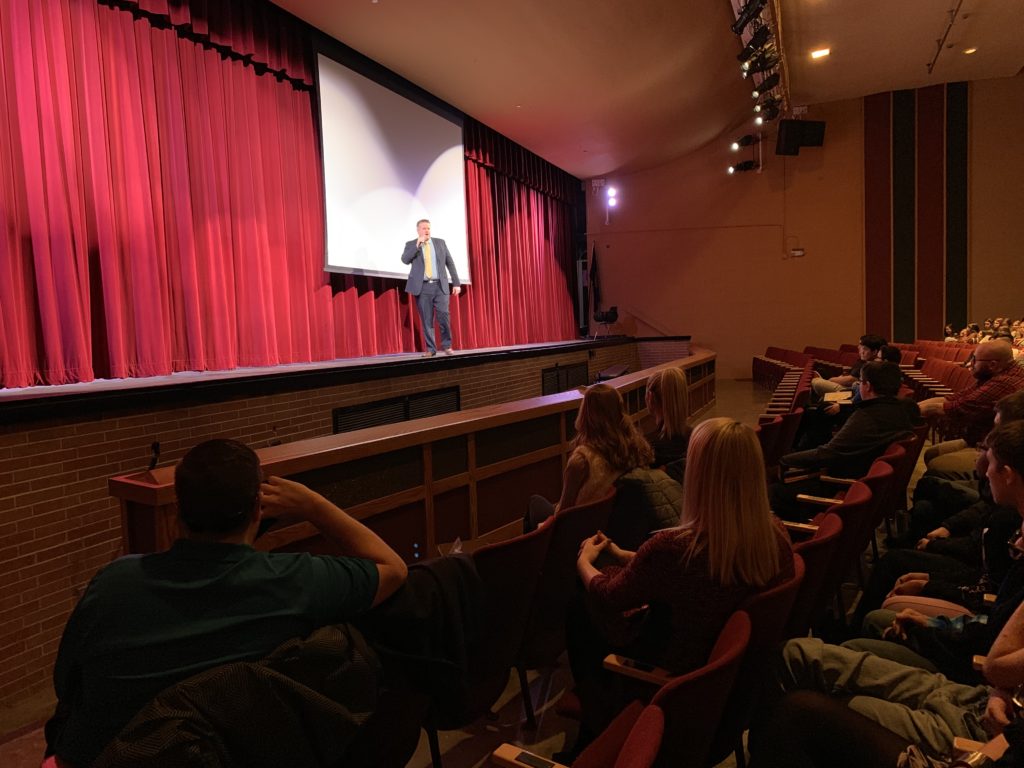 Matt Mueller speaks to students Fremont High School Auditorium
