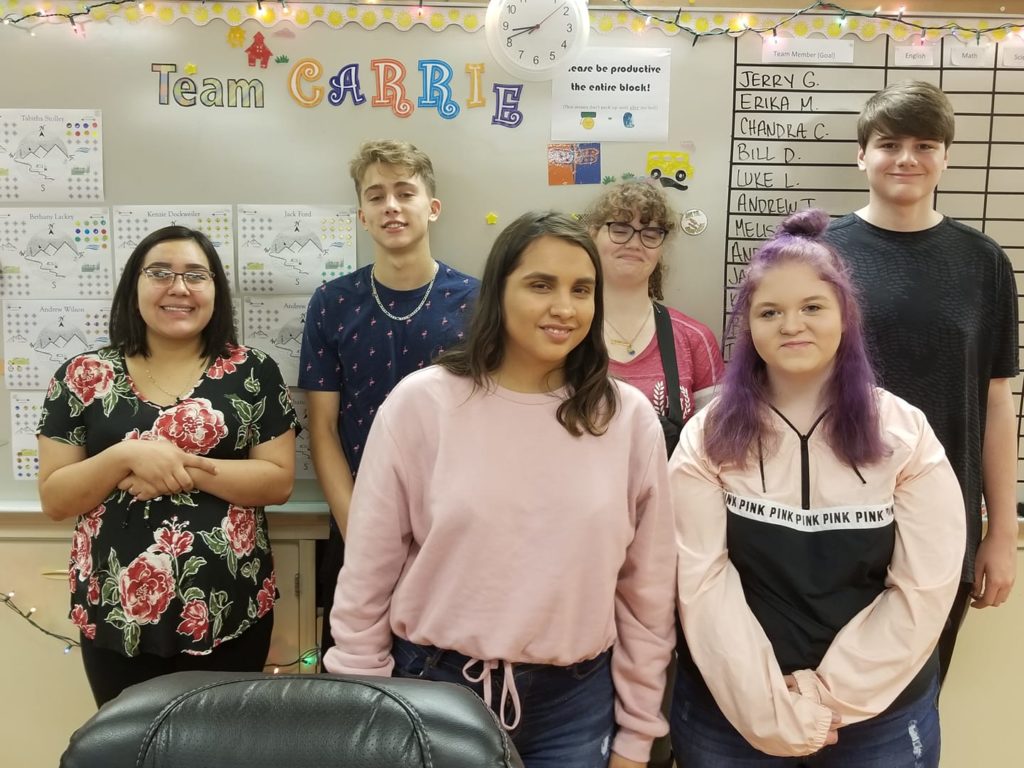 Students in front of whiteboard