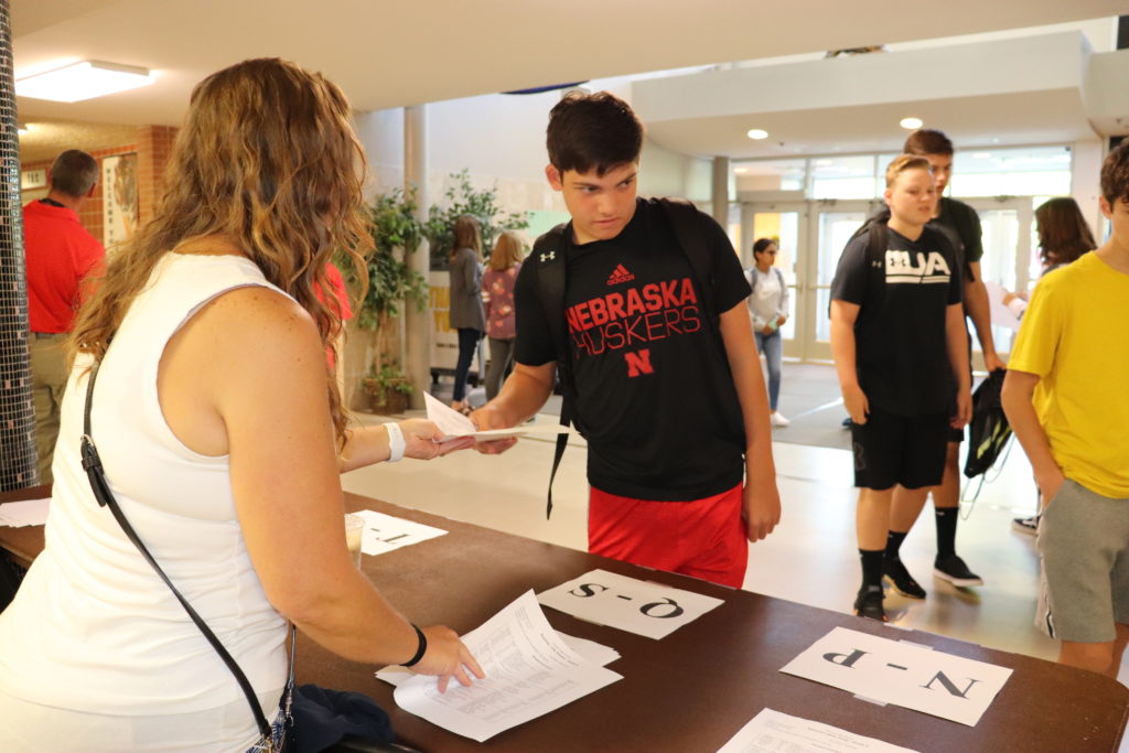 Student receiving handout Fremont High School